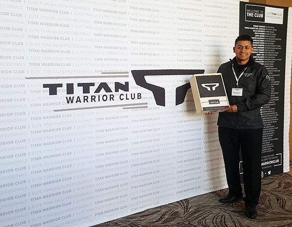 This award-winning sales professional is standing in front of the new Nissan TITAN Warrior pop-up display. 12-Point SignWorks - Franklin, TN