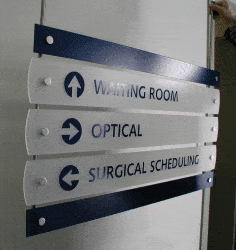 Architectural display used for wayfinding signage using a rod system. 12-Point SignWorks - Franklin TN