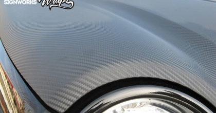 A close-up view of the carbon fiber hood wrap on a Jeep. 12-Point SignWorks - Franklin TN