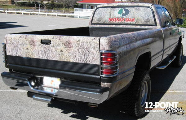 Custom Mossy Oak camo wrap on a Dodge RAM truck. 12-Point SignWorks - Franklin TN