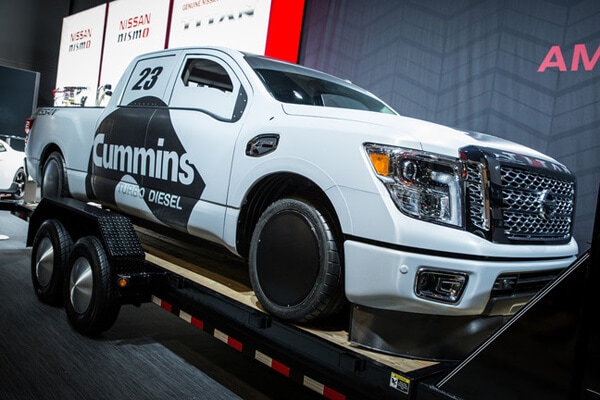 The completed wrap and modifications of the 2016 Nissan TITAN XD at the 2015 SEMA Show in Las Vegas. 12-Point SignWorks