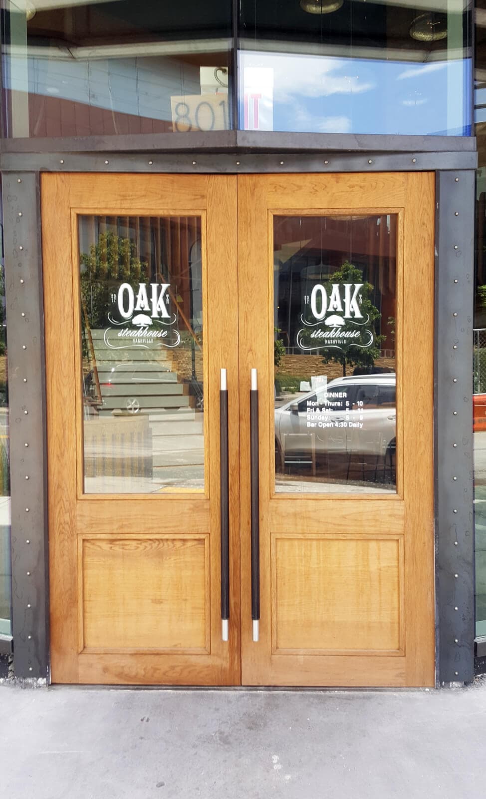 Window vinyl for the Oak Steakhouse by 12-Point SignWorks in Franklin, TN.