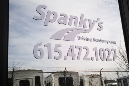 Custom Window Graphics for Spanky's Driving Academy by 12-Point SignWorks in Franklin, TN.