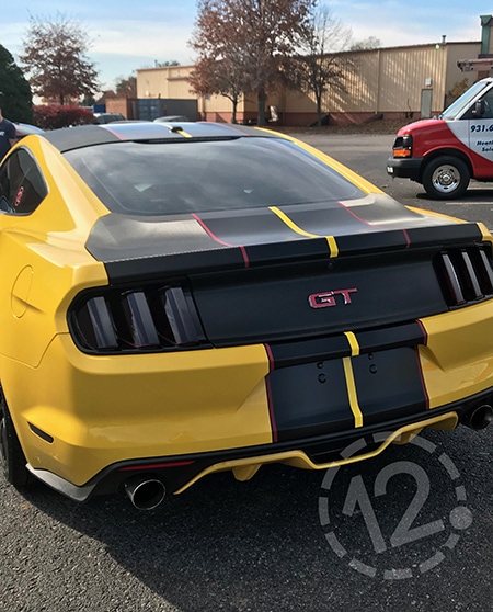 These stripe accents will definitely be noticed when Michael is driving his Mustang around town! 12-Point SignWorks - Franklin, TN