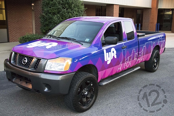 We created this vibrant custom advertising wrap for Lyft. 12-Point SignWorks - Franklin, TN