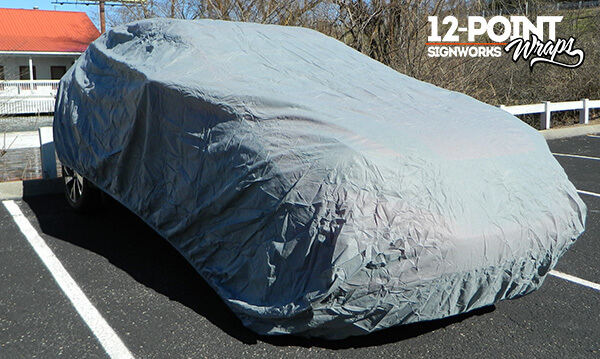 Nissan Murano under cover at our shop in Franklin, TN. 12-Point SignWorks