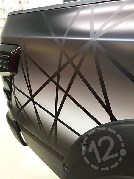 Webbed stripes in the TITAN XD custom vehicle wrap. 12-Point SignWorks - Franklin, TN