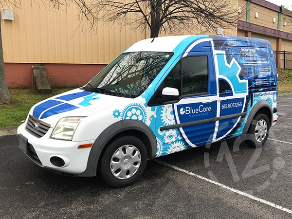 Front View of Tech-Inspired Custom Van Wrap for BlueCore Technologies. 12-Point SignWorks - Franklin, TN