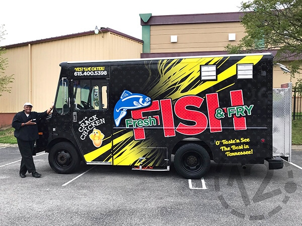 We designed & installed Nashville's Fresh Fish & Fry food truck wrap! 12-Point SignWorks - Franklin, TN
