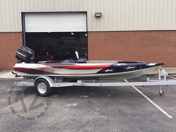 Custom partial boat wrap with an American flag design. 12-Point SignWorks - Franklin, TN