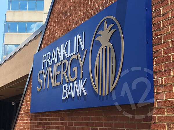 Franklin Synergy Bank halo lit sign during the day. 12-Point SignWorks - Franklin, TN