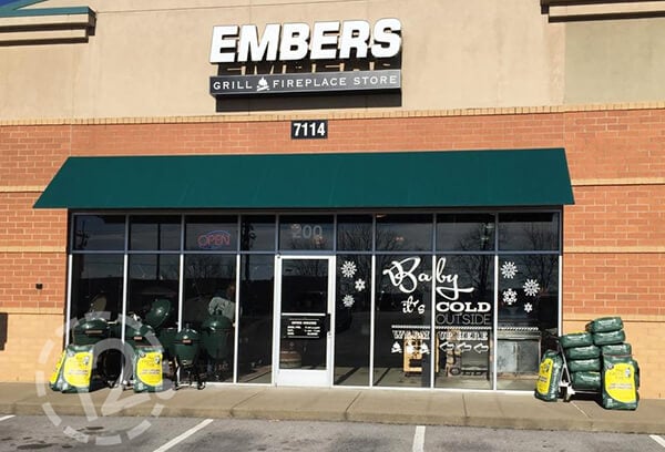 Holiday window graphics for Embers Grill & Fireplace Store by 12-Point SignWorks in Franklin, TN.