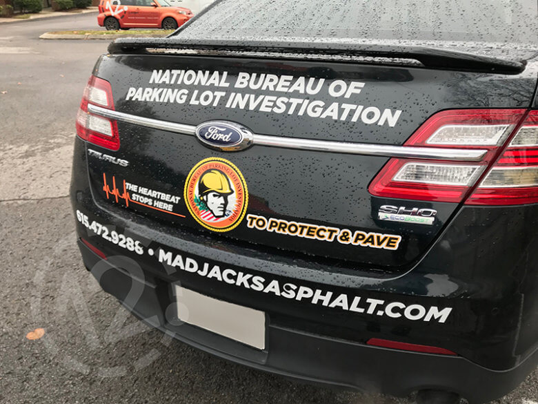 Custom car graphics for Mad Jack's Asphalt & Concrete in Franklin, TN by 12-Point SignWorks.