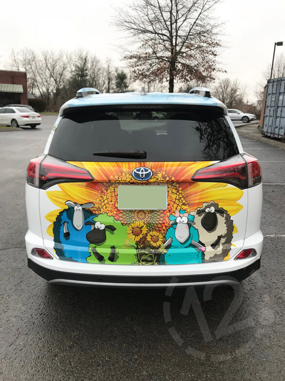 Rear Door of the Wooly Wagon Custom Car Wrap by 12-Point SignWorks in Franklin, TN.