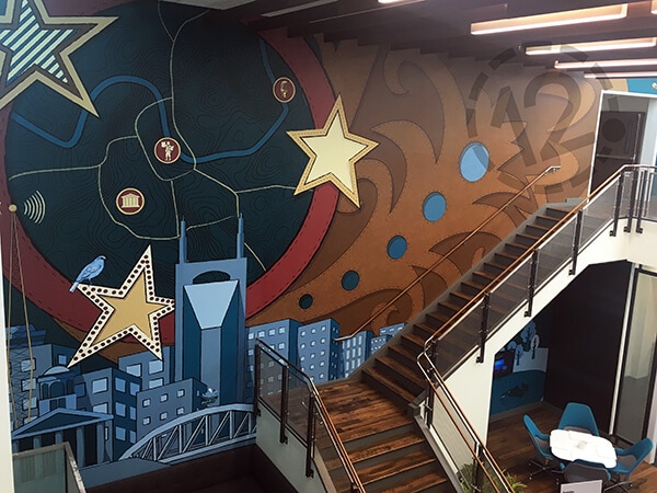 Custom wall mural for Deloitte in Nashville, TN printed and installed by 12-Point SignWorks.