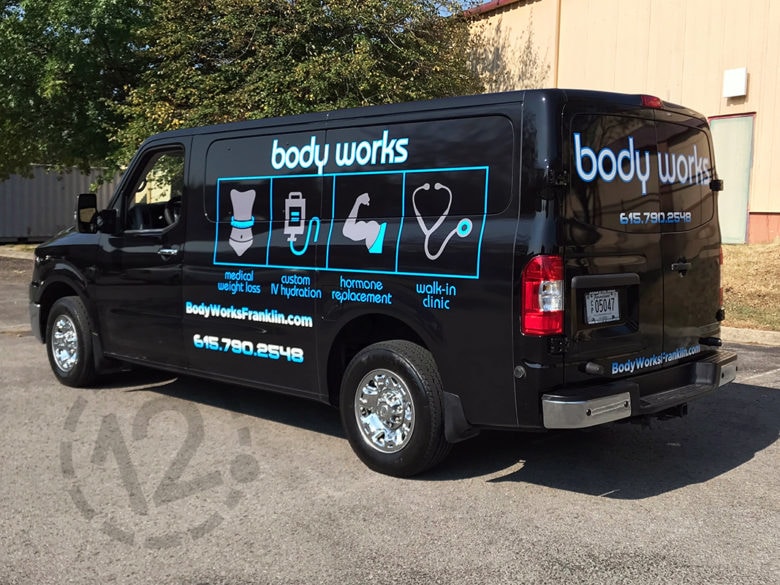 Custom advertising wrap for Body Works in Franklin, TN by 12-Point SignWorks.