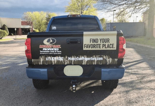Back of Truck Wrap Design for Mossy Oak installed by 12-Point SignWorks