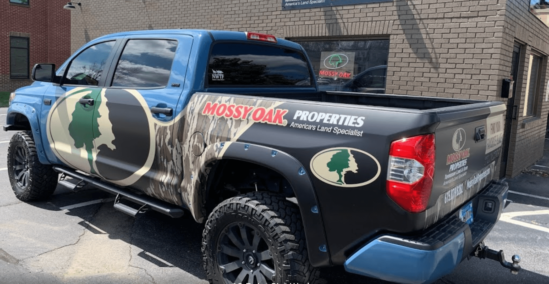 Owner Jamie Spencer Photo of Truck Wrap by 12-Point SignWorks