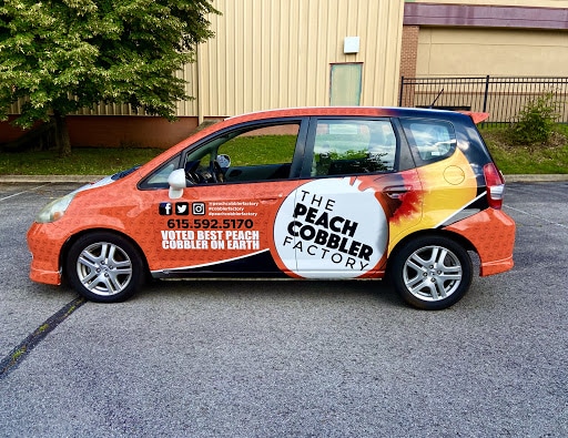 Newest Vehicle Wrap for The Peach Cobbler Factory by 12-Point SignWorks