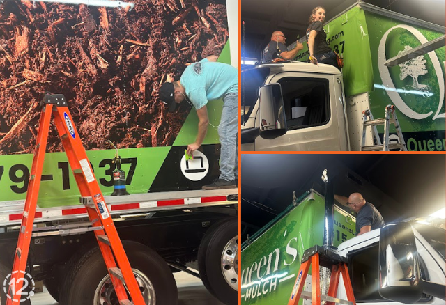 Queens Tree Service vehicle wrap process with the team placing the wrap