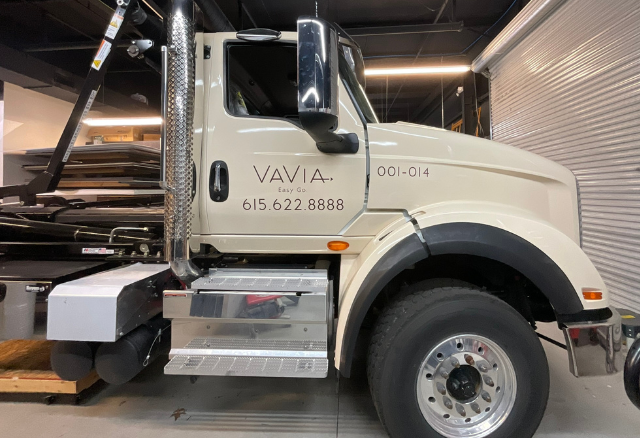 Truck featuring vehicle wrap.